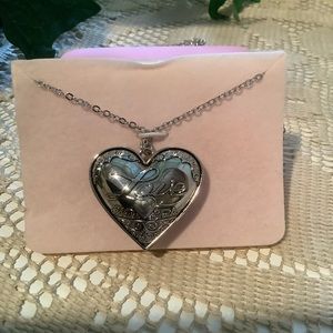 Large heart shape pendant necklace love never fails 1 cor:13 in message box New